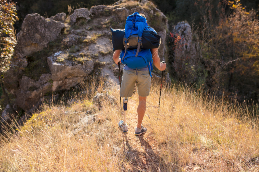 Ascent Caregivers Man With Prosthetic Leg Hiking.