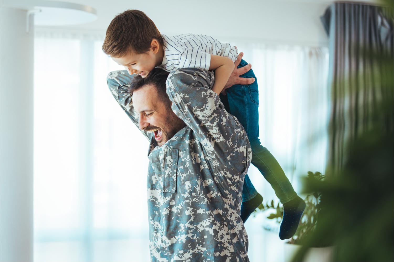 A father with his son on his shoulders