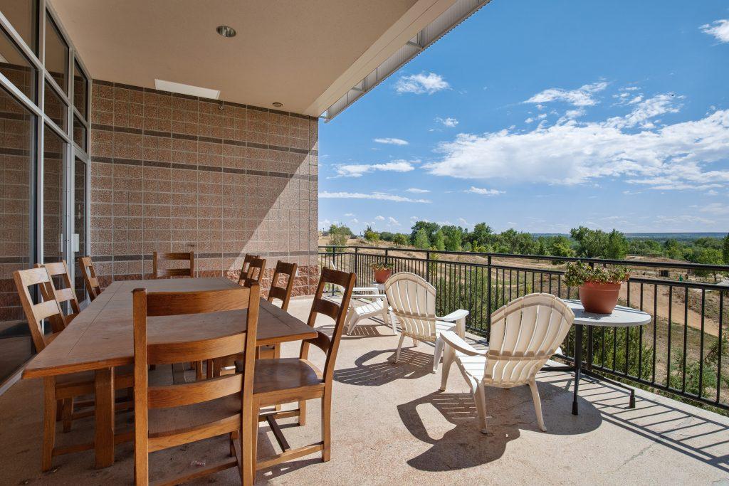 Crisis Center patio with table and chairs.