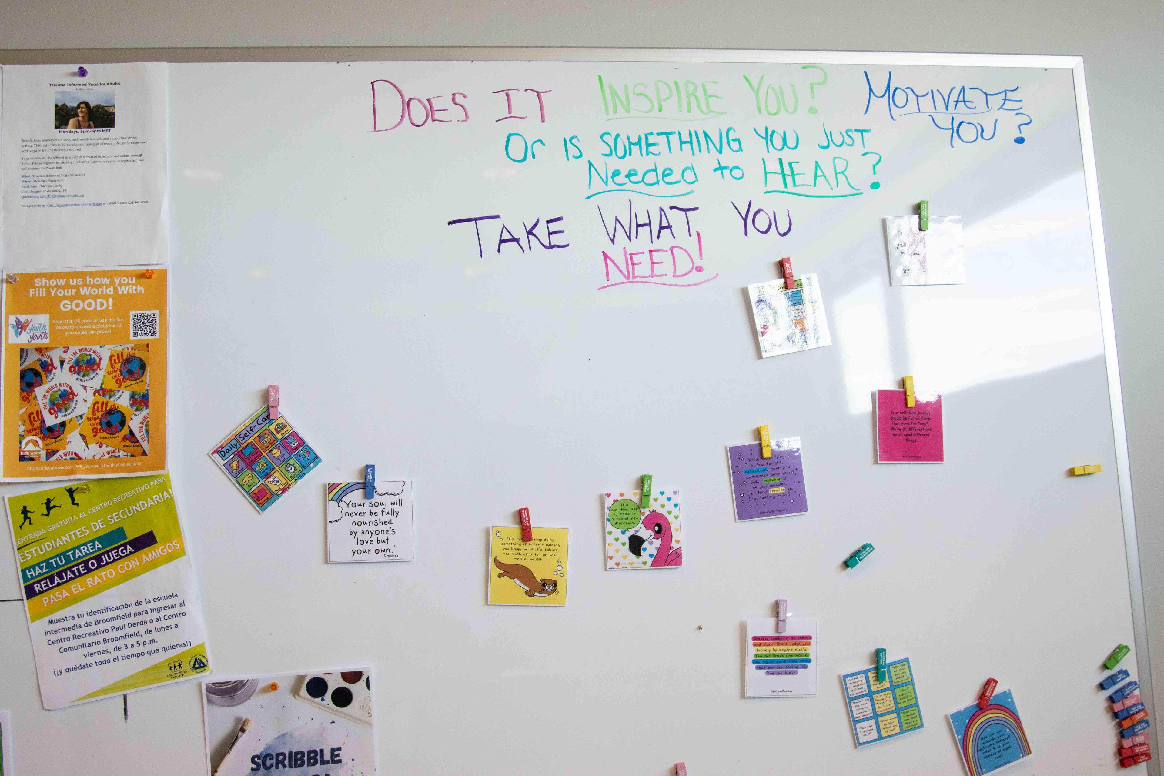 Whiteboard in Broomfield lobby with writing. "Does it inspire you? Motivate you? Or is something you just needed to hear? Take what you need!"