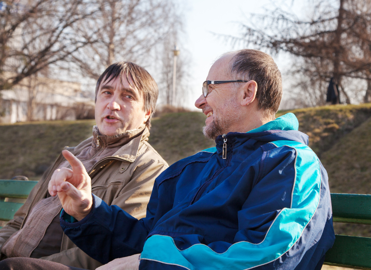 Peer Support Two People Talking on Bench