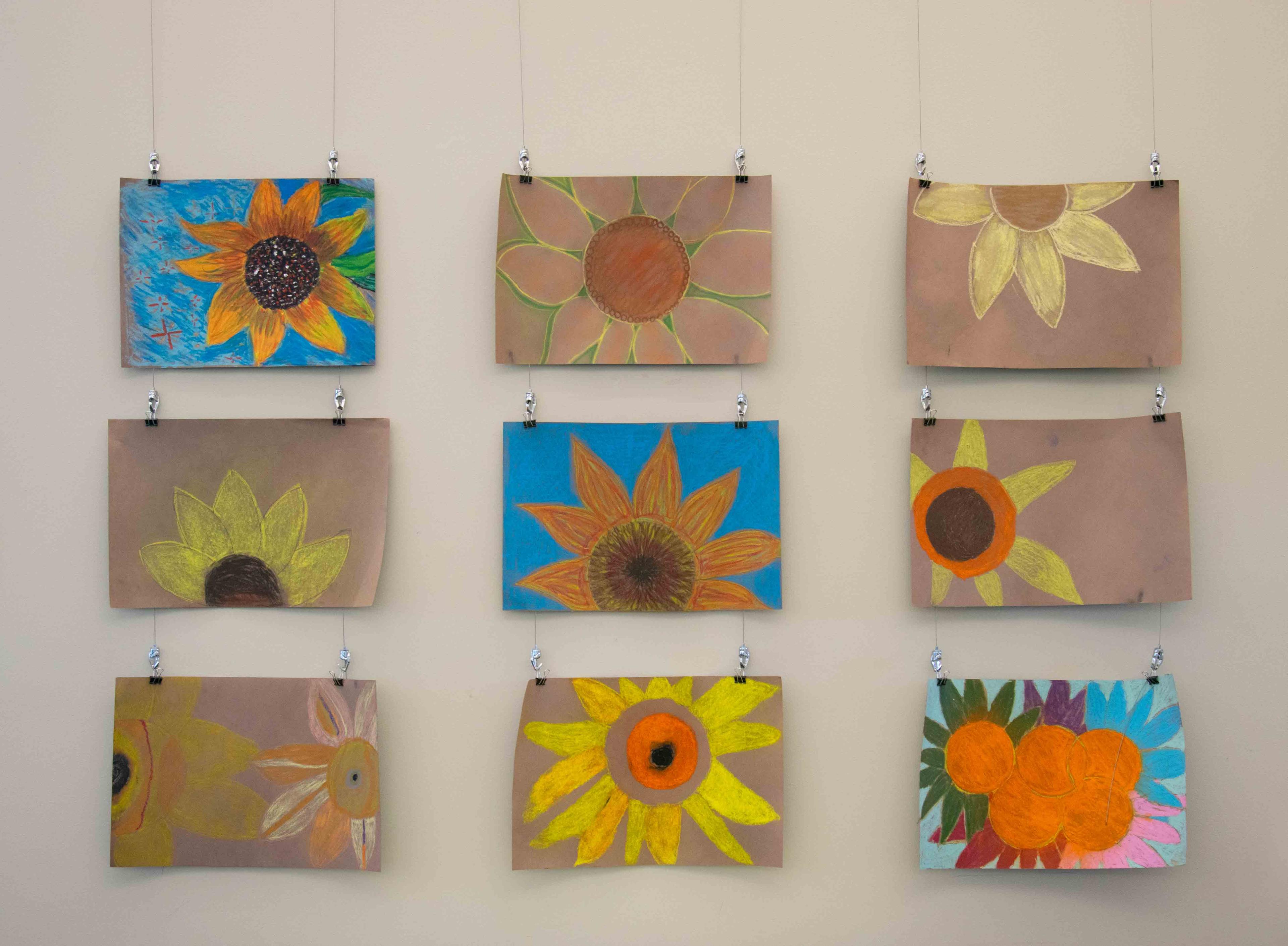 Sunflower and orange artwork.